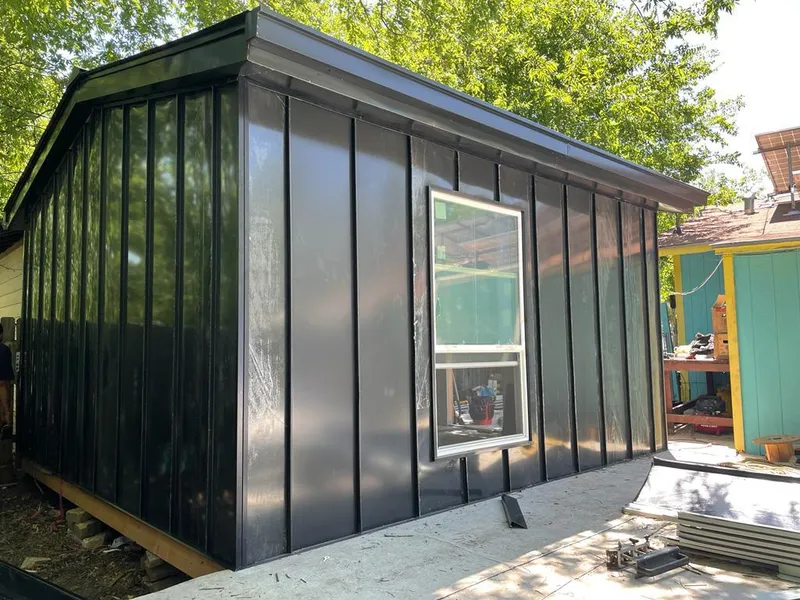 Black standing seam metal wall panels for Metal Roof Installation in Grafton